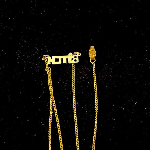 A gold toned and rhinestone necklace - Picture 5 of 7